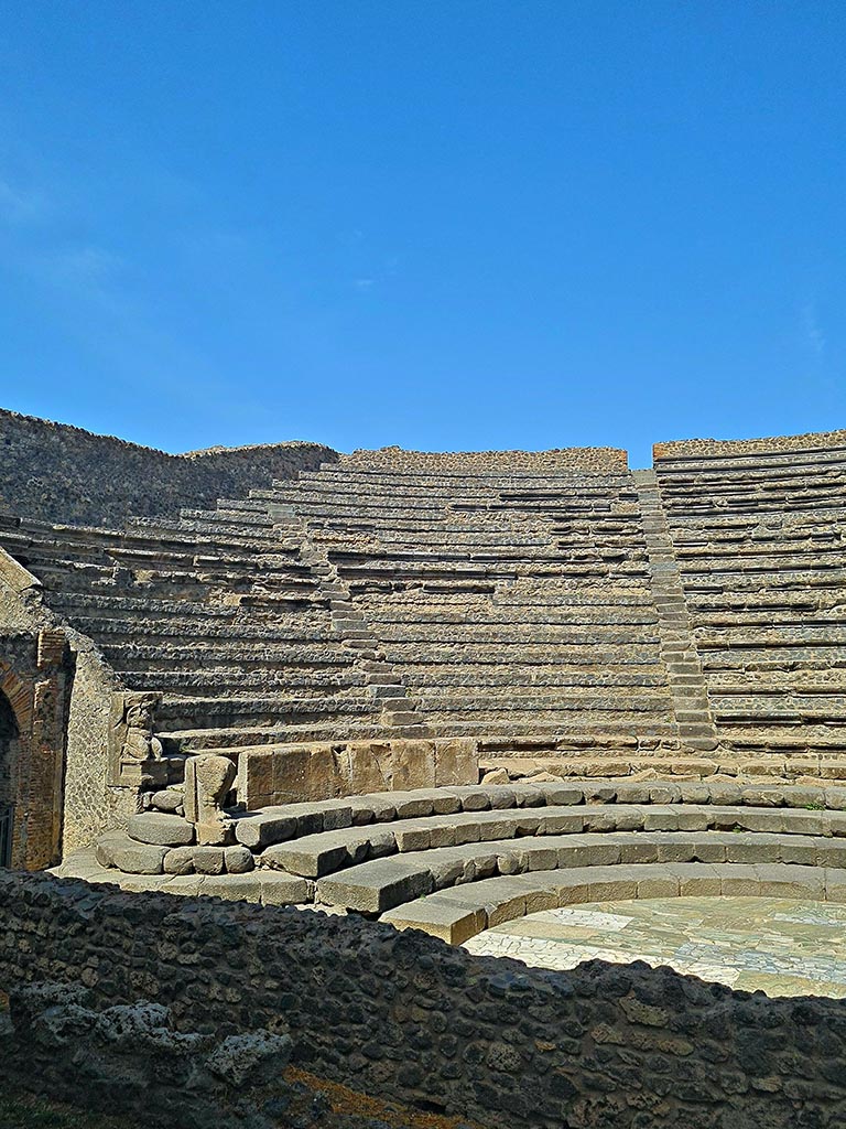 VIII.7.19/18 Pompeii. September 2024. 
Looking towards seating on west side, from stage. Photo courtesy of Giuseppe Ciaramella.
