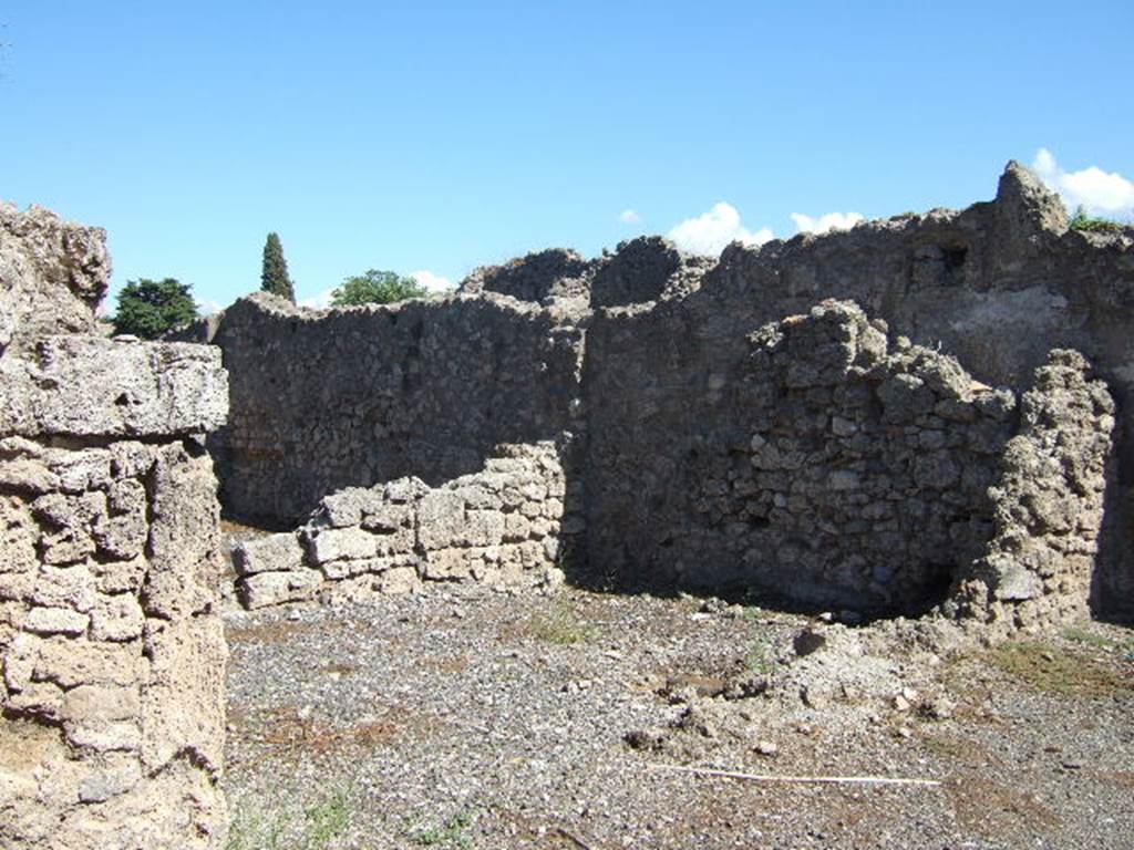 VIII.7.26 Pompeii. September 2005. Looking south-east at the south side of the third and second rooms on the east.