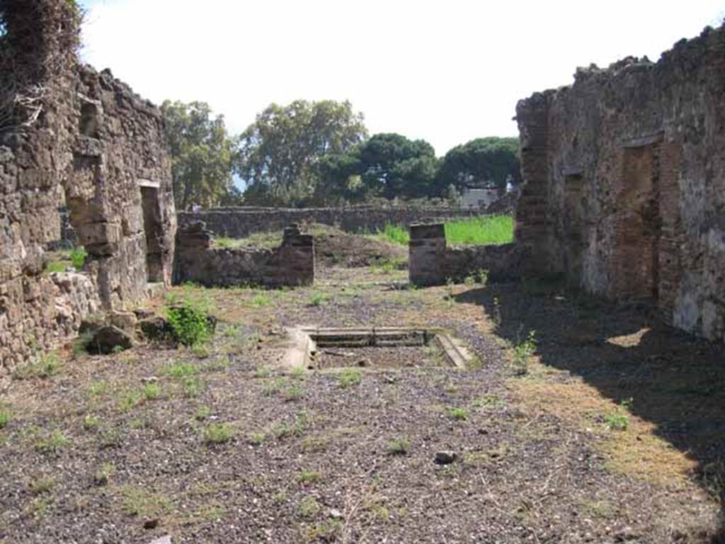 VIII.7.26 Pompeii. September 2010. Looking south across atrium towards garden area and the Odeon. Photo courtesy of Drew Baker.
