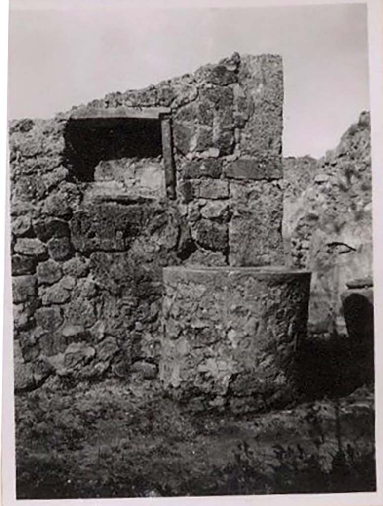 IX.1.3/33 Pompeii. Pre-1943. 
Looking west from oven towards one of the tubs with niche above, the one on south side of doorway, no longer there. 
Photo by Tatiana Warscher.
See Warscher, T. Codex Topographicus Pompeianus, IX.1. (1943), Swedish Institute, Rome. (no.10), p. 22.

