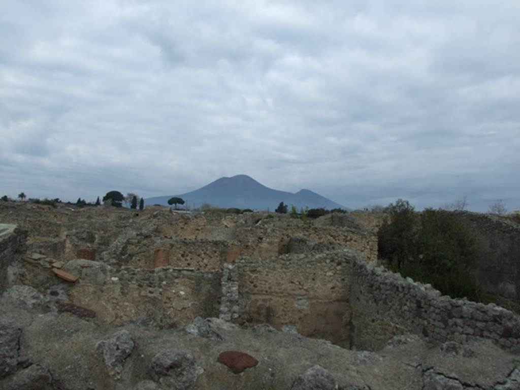 IX.1.20 Pompeii. December 2007. Room 16, view from upper floor.
Looking north across IX.1 towards Vesuvius
