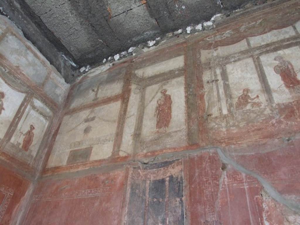 IX.5.6 Pompeii. December 2007. Room 10, west wall of tablinum. Wall painting of figures or gods at high level.
