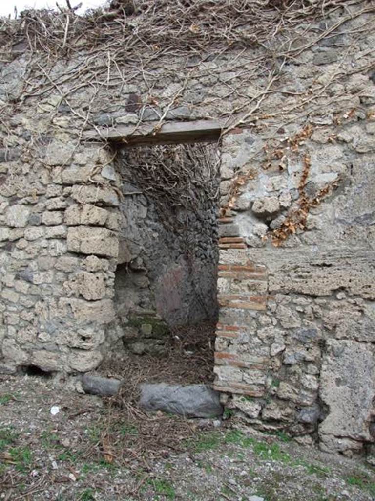 IX.7.17 Pompeii. December 2007. Entrance doorway, with imprint of steps to upper floor on north wall.