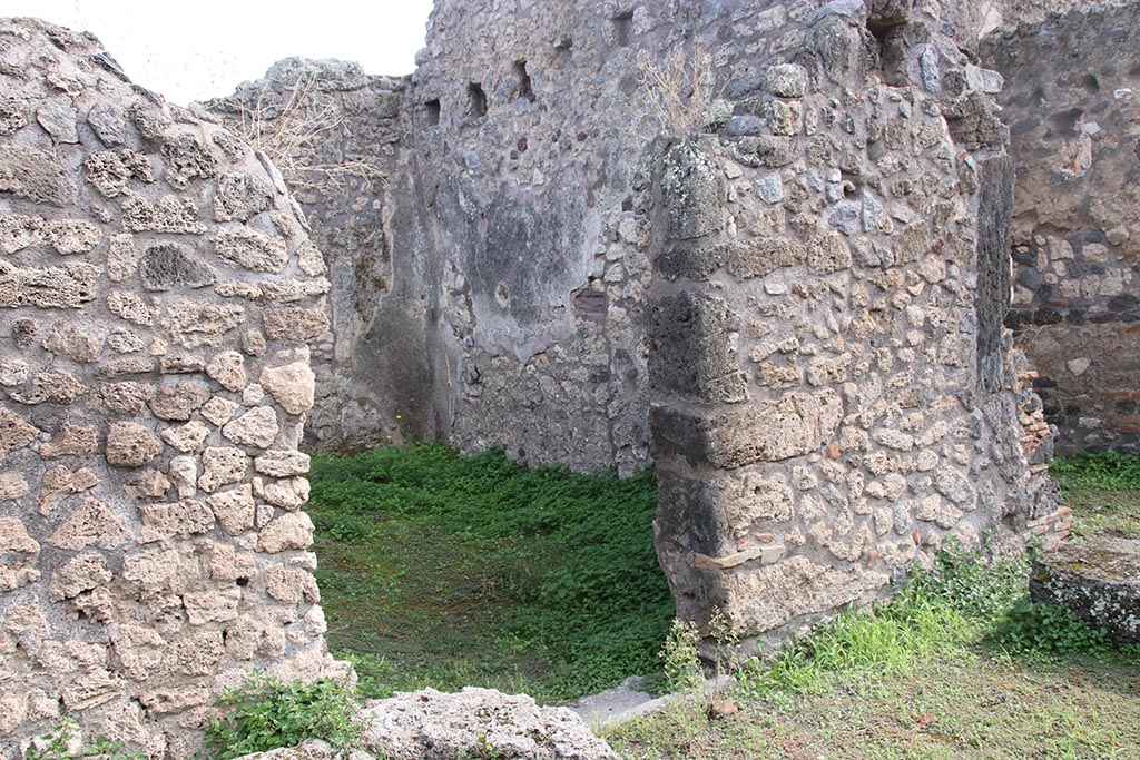 IX.7.21 Pompeii. October 2024. Looking through doorway to room on south-east side of atrium. Photo courtesy of Klaus Heese