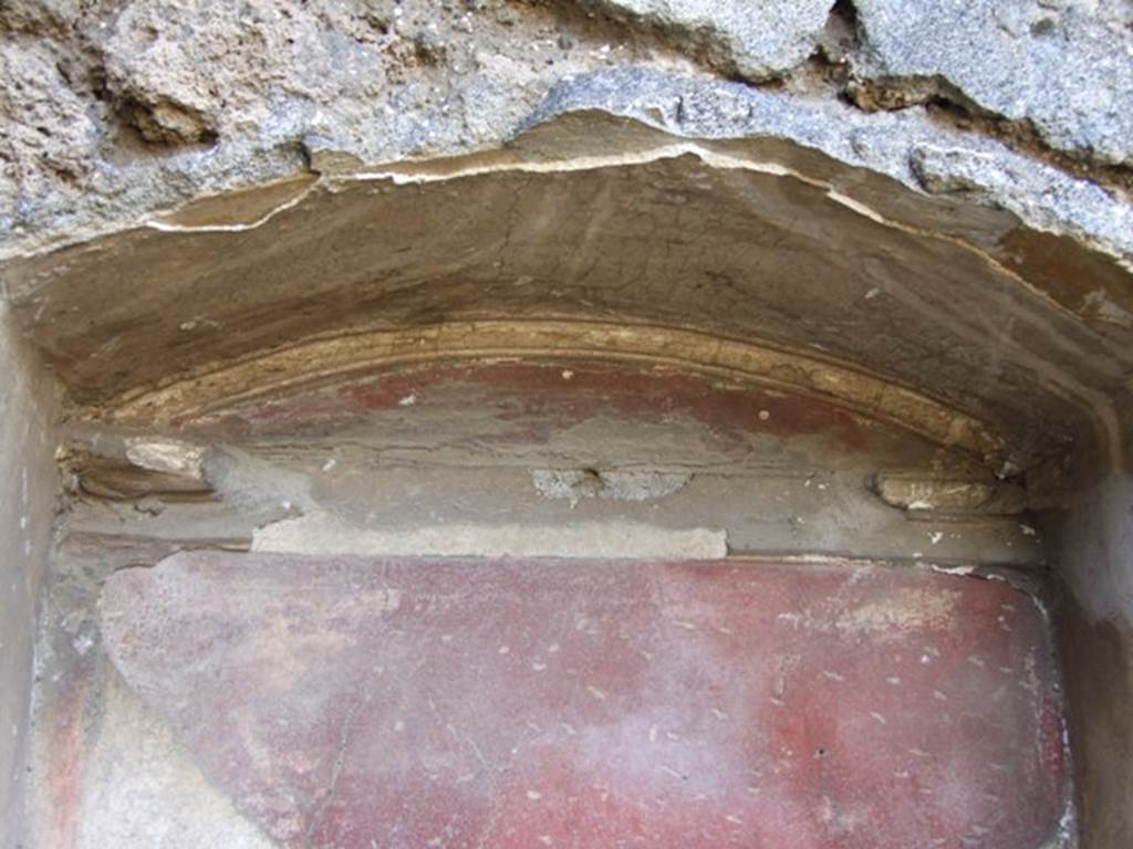 IX.9.13 Pompeii.  March 2009. Detail of Lararium Niche. 