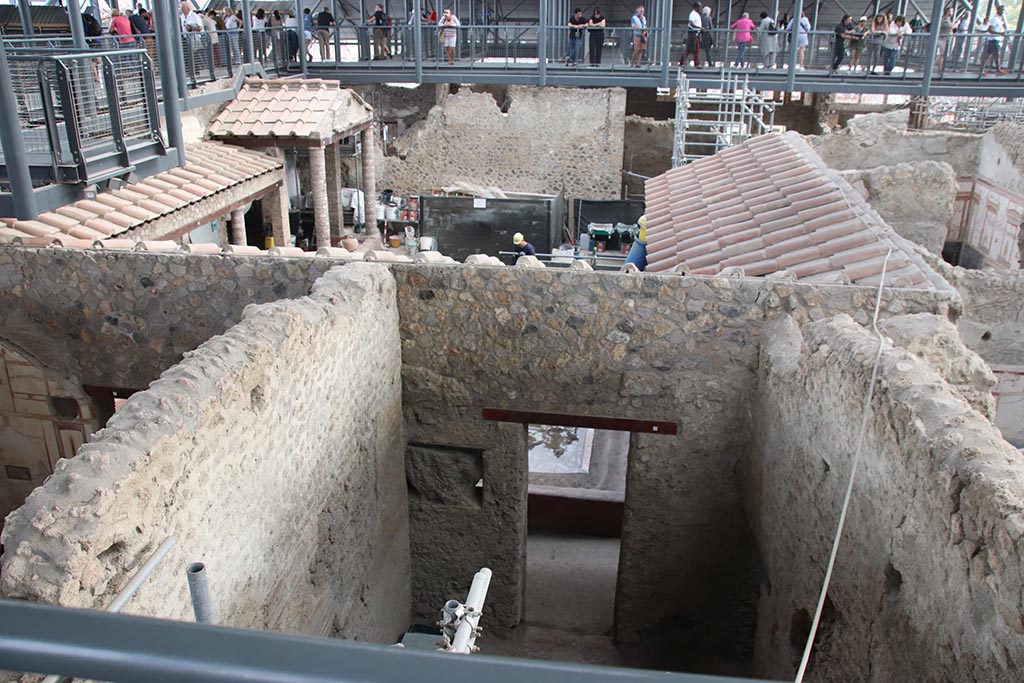 IX.12.9/IX.12.A Pompeii. October 2024. Looking south above room 14, with room 13, on left. Photo courtesy of Klaus Heese.