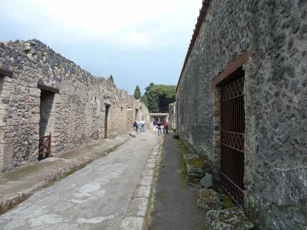 Via di Castricio, May 2010. Looking east between I.12 and I.15, from near I.15.2.