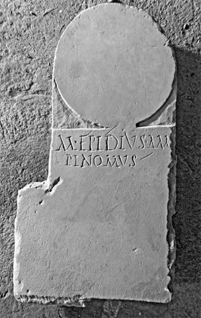 Pompeii Fondo Azzolini. Tomb 5: Marcus Epidius Ampinomus.
Columella with inscription
M EPIDIUS AM
PINOMUS

M(arcus) Epidius Ampinomus

See Notizie degli Scavi di Antichità, 1916, 303, t5.
Photo © Umberto Soldovieri.