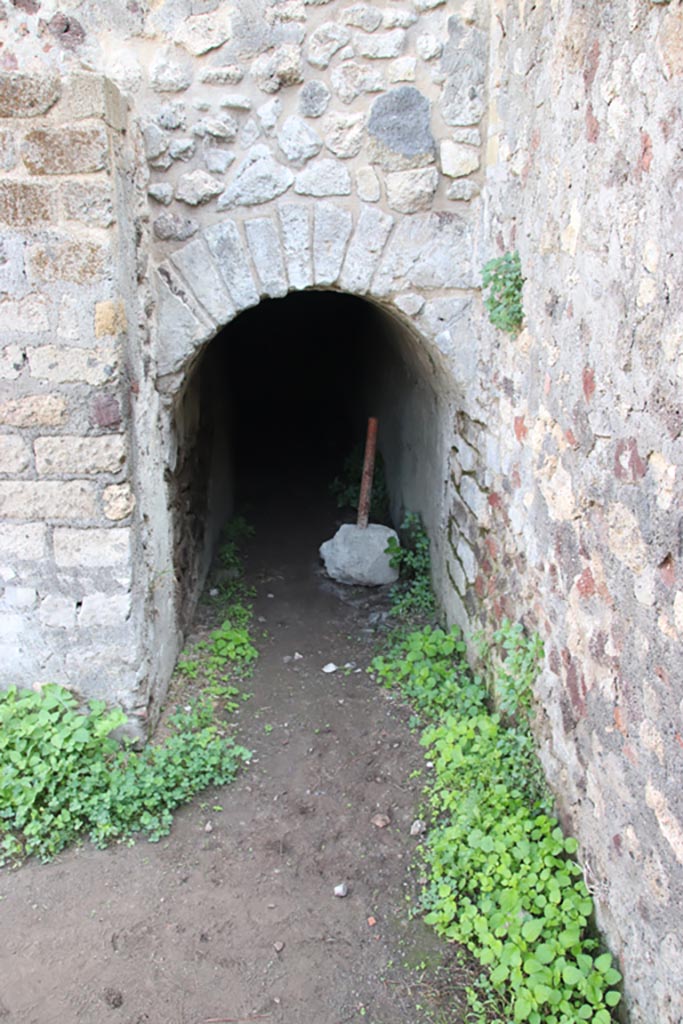 HGW25 Pompeii. Part of Villa of Diomedes. October 2023. 
Arched entrance to cellar. Photo courtesy of Klaus Heese.
