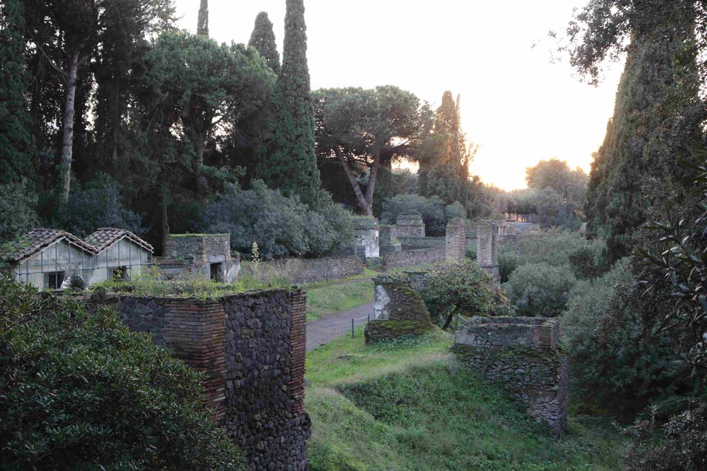 Pompeii Porta Nocera. December 2018. 
Looking west along Via delle Tombe, from rear of tomb 36EN, on left, towards east side of tomb 32EN, on right. Photo courtesy of Aude Durand.
