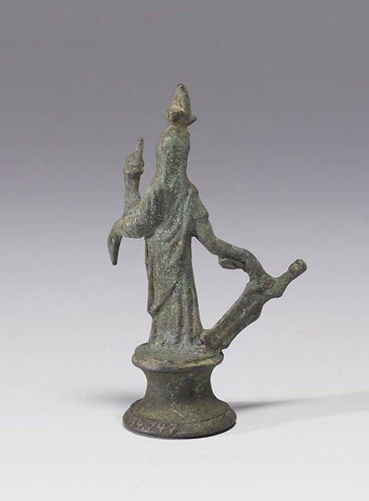 Boscoreale, Villa rustica in fondo DAcunzo. Room 12, lararium. 
Bronze statuette of Isis-Fortuna, rear view.
Photo courtesy of The Walters Art Museum, Baltimore. Inventory number 54.747.
http://thewalters.org/
Creative Commons Attribution-ShareAlike 3.0 Unported Licence

