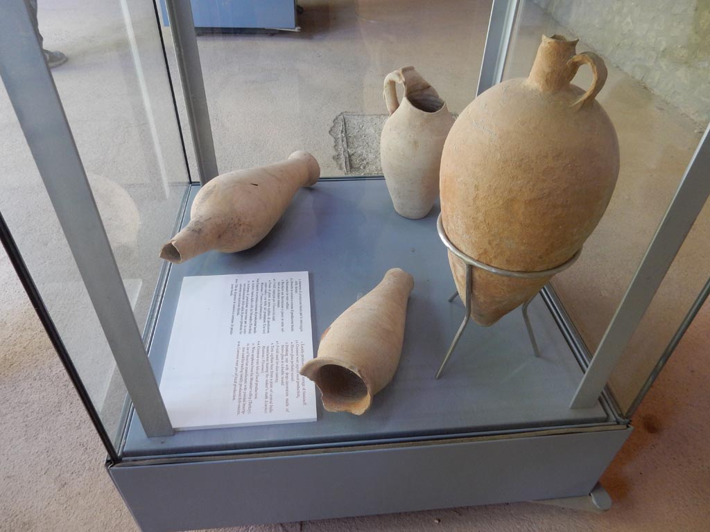Complesso dei triclini in località Moregine a Pompei. 1959 excavation photo on display in Pompeii Palaestra September 2015. 
Ceramic tableware under excavation.
