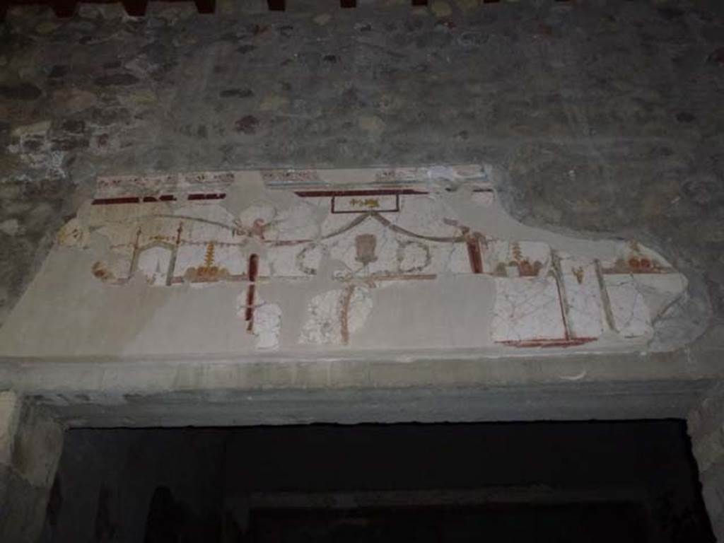 Oplontis, September 2011. Room 23, detail of painted decoration above doorway in portico 24. Photo courtesy of Michael Binns.