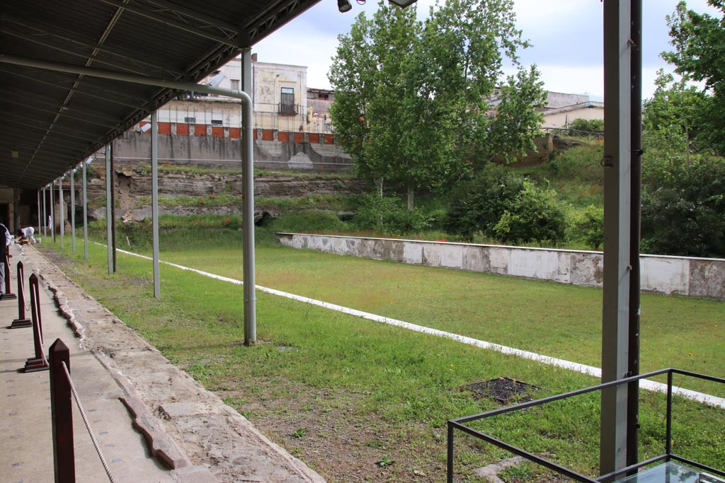 Oplontis Villa of Poppea, May 2024. Looking north-east across pool from Portico 60. Photo courtesy of Klaus Heese.