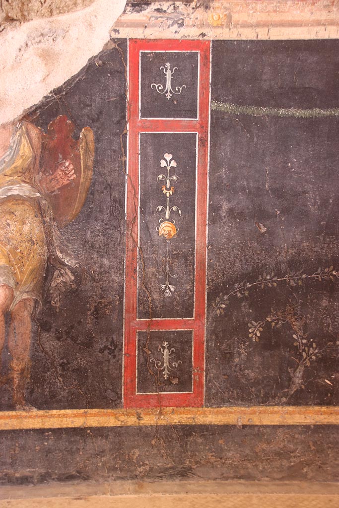 VI.15.1 Pompeii. October 2024. 
Lower west wall with painted decoration on zoccolo. Photo courtesy of Klaus Heese.
