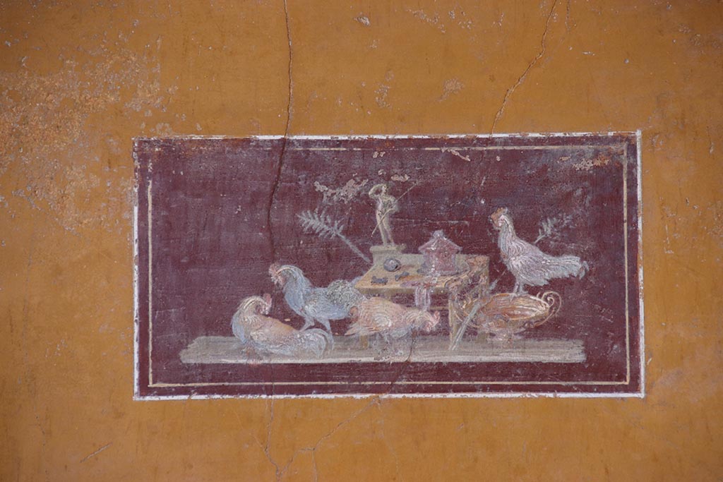 VI.15.1 Pompeii. October 2024. Detail of painted panel in middle of north wall of ala i. Photo courtesy of Klaus Heese.