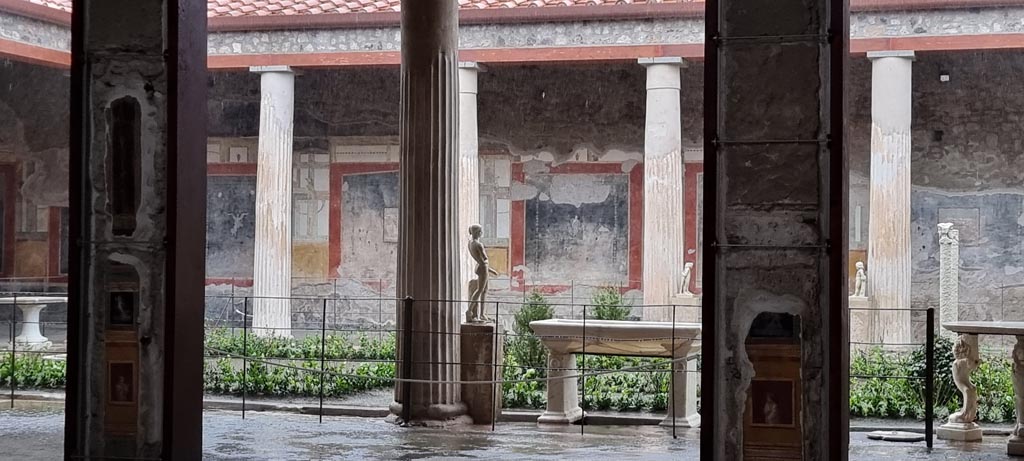 VI.15.1 Pompeii. January 2023. Looking south-west towards peristyle (l) from atrium (c). Photo courtesy of Miriam Colomer.