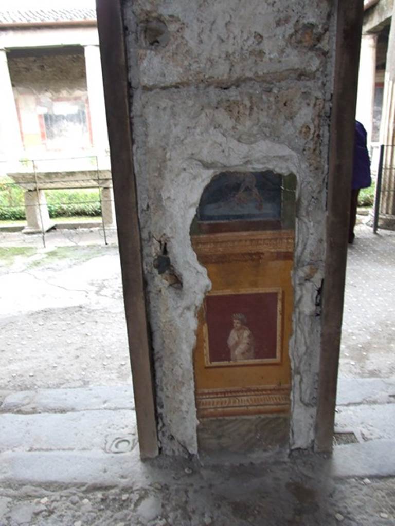 VI.15.1 Pompeii. December 2006.  Detail of second painted pillar between Peristyle and Atrium.