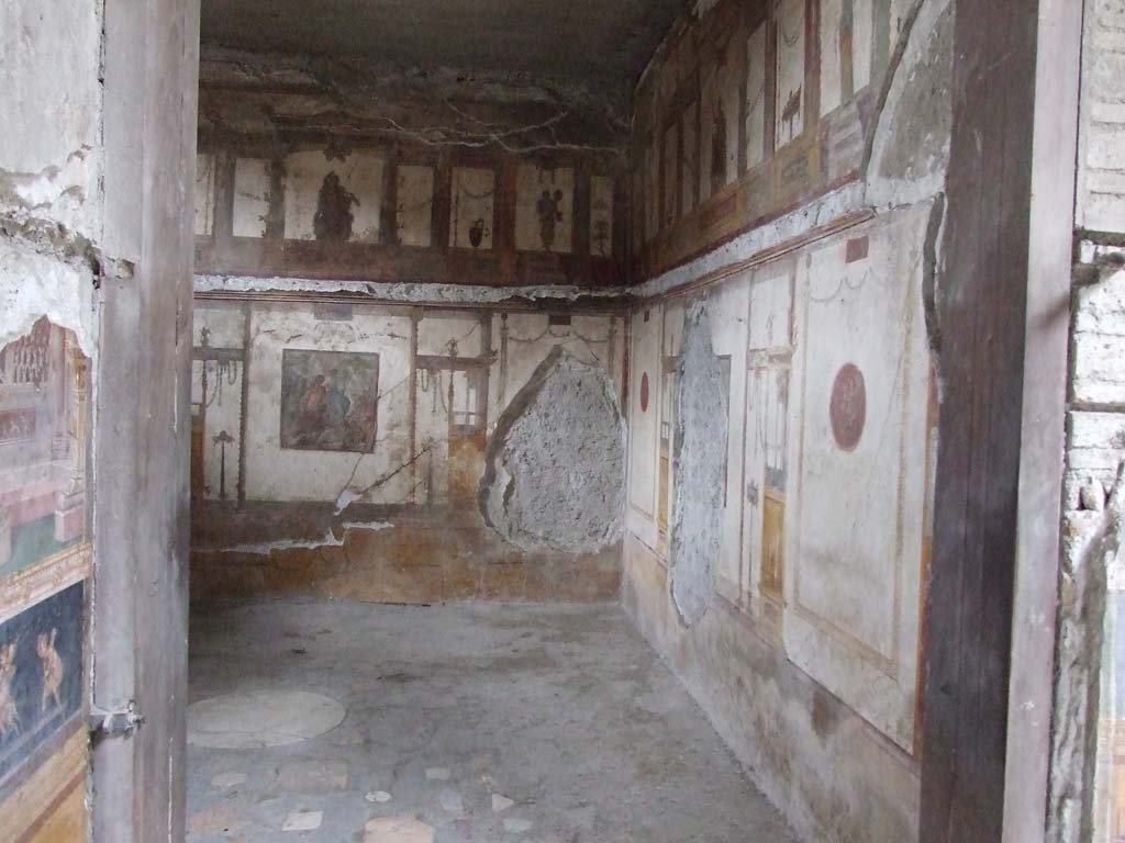 VI.15.1 Pompeii. December 2006. Looking through doorway towards south-west corner of oecus on south side of atrium.