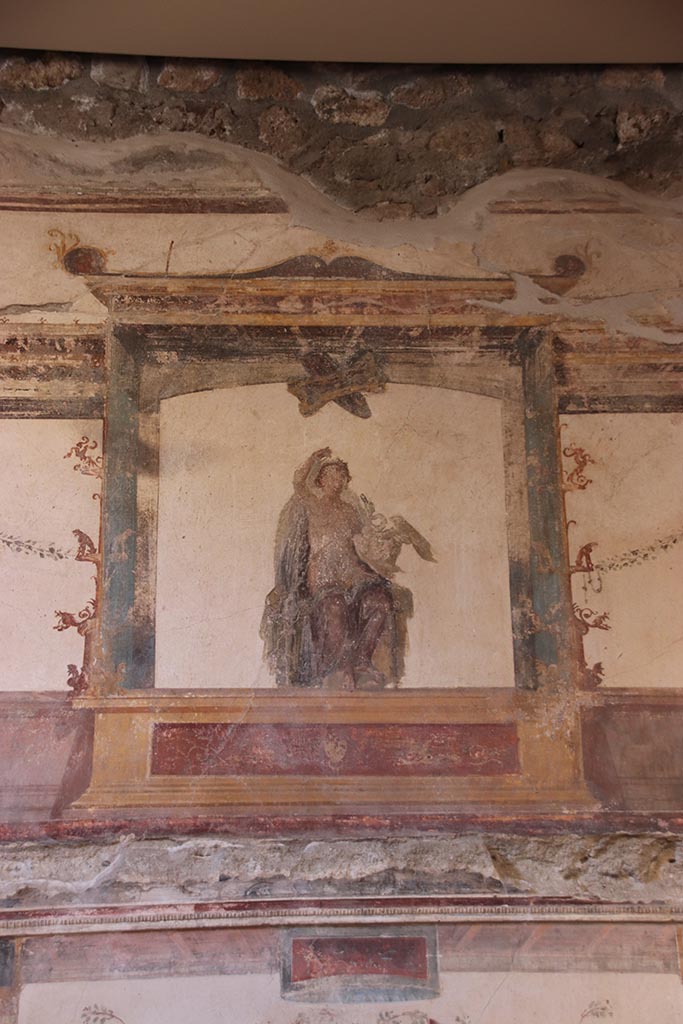 VI.15.1 Pompeii. October 2024. 
Painted figure of Leda and the Swan from centre of upper south wall of oecus. Photo courtesy of Klaus Heese.
