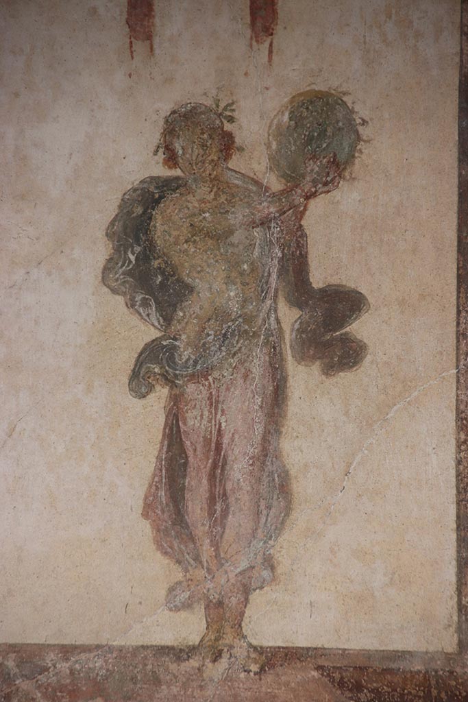 VI.15.1 Pompeii. October 2024. 
Detail of painted figure of Muse Urania, from west end of south wall of oecus. 
Photo courtesy of Klaus Heese.

