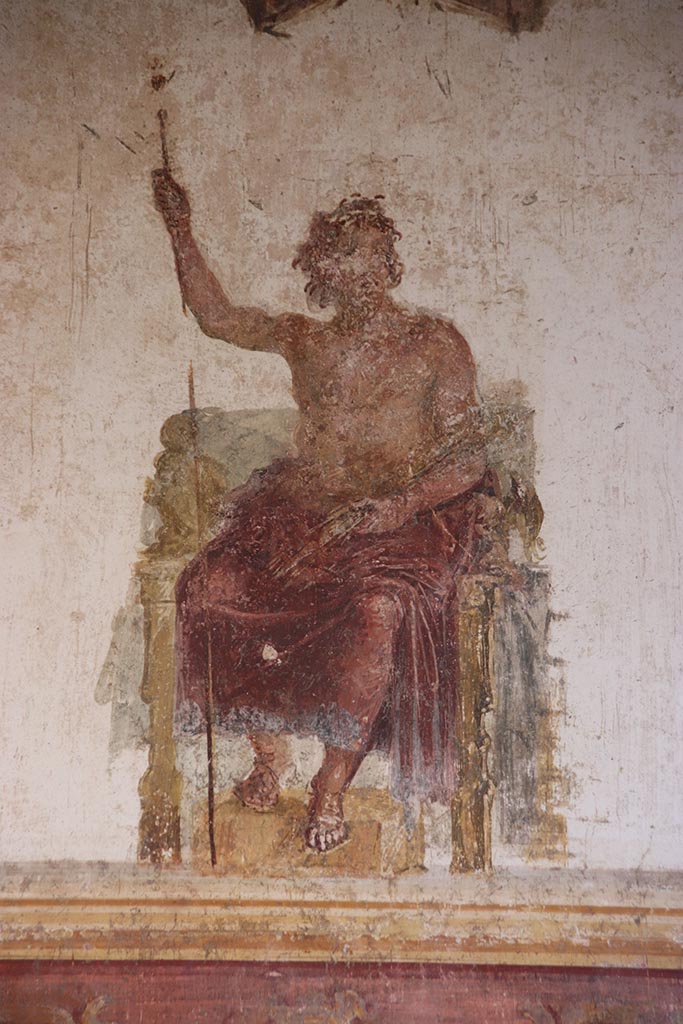 VI.15.1 Pompeii. October 2024. 
Upper centre of west wall of oecus, detail of painted figure of Zeus. Photo courtesy of Klaus Heese
