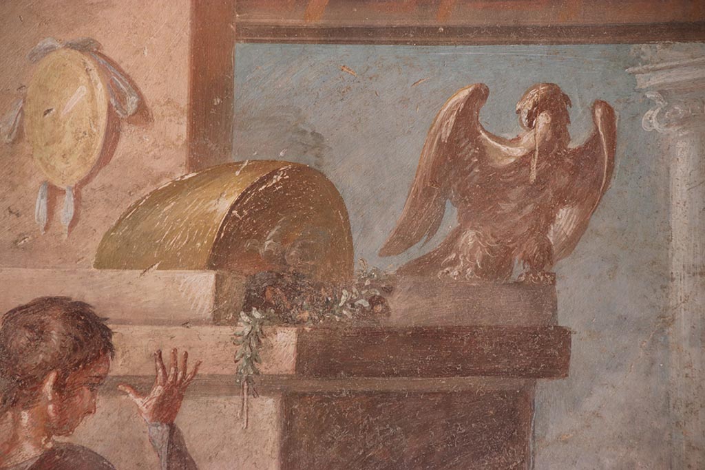 VI.15.1 Pompeii. October 2024. 
North wall of exedra, upper centre showing Zeus, father of Hercules, as an eagle. Photo courtesy of Klaus Heese.

