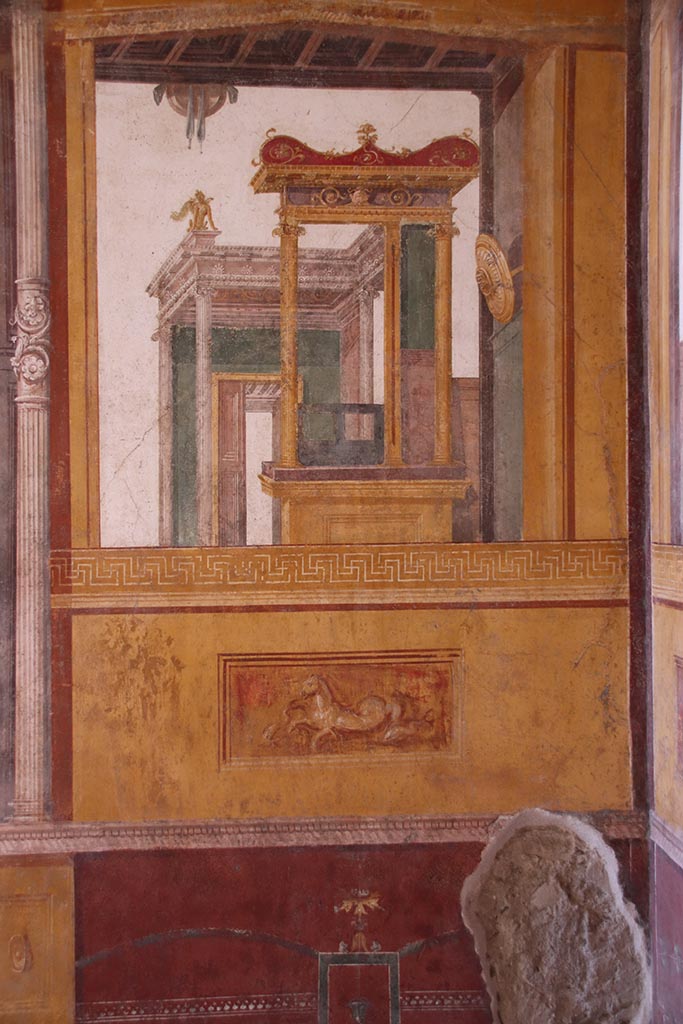 VI.15.1 Pompeii. October 2024. 
Architectural wall painting on north wall at east end of exedra. Photo courtesy of Klaus Heese.
