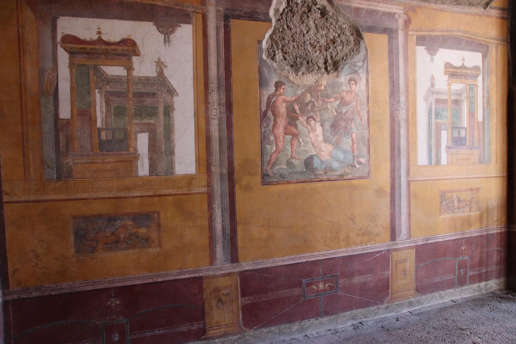 VI.15.1 Pompeii. October 2024. Looking west along south wall of exedra. Photo courtesy of Klaus Heese..

