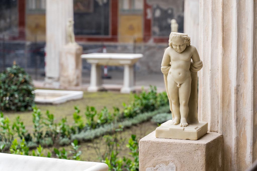 VI.15.1 Pompeii. March 2023. Second statue on west side of peristyle, looking south-east. Photo courtesy of Johannes Eber.