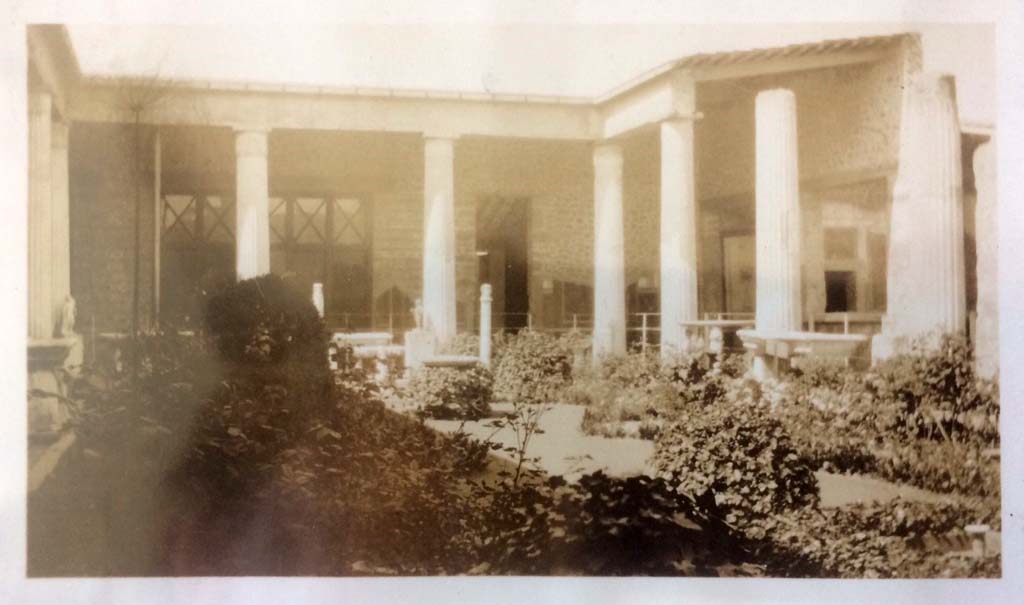 VI.15.1 Pompeii. April 1903. Looking north across peristyle garden area towards north-east corner, and unroofed atrium, on right. Photo courtesy of Rick Bauer.
