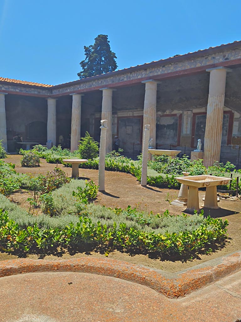 VI.15.1 Pompeii. June 2024. 
Looking south-west across peristyle, from north-east portico. Photo courtesy of Giuseppe Ciaramella.
