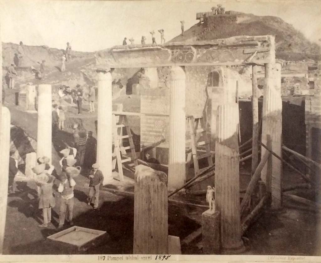 VI.15.1 Pompeii. 1895 photograph by Esposito. Looking east from south side of garden area, during excavations. On the right is the doorway to the Exedra in SE corner, on the left is the atrium still under excavation.  Photo courtesy of Rick Bauer.
