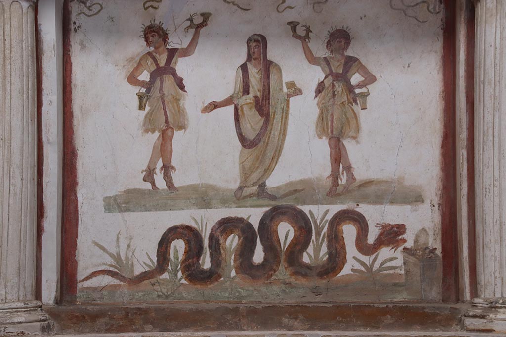 VI.15.1 Pompeii. October 2024. Lararium painting below aedicula. Photo courtesy of Klaus Heese.