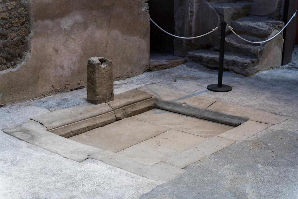 VI.15.1 Pompeii. March 2023. Looking south-east across impluvium in services area towards steps. Photo courtesy of Johannes Eber.