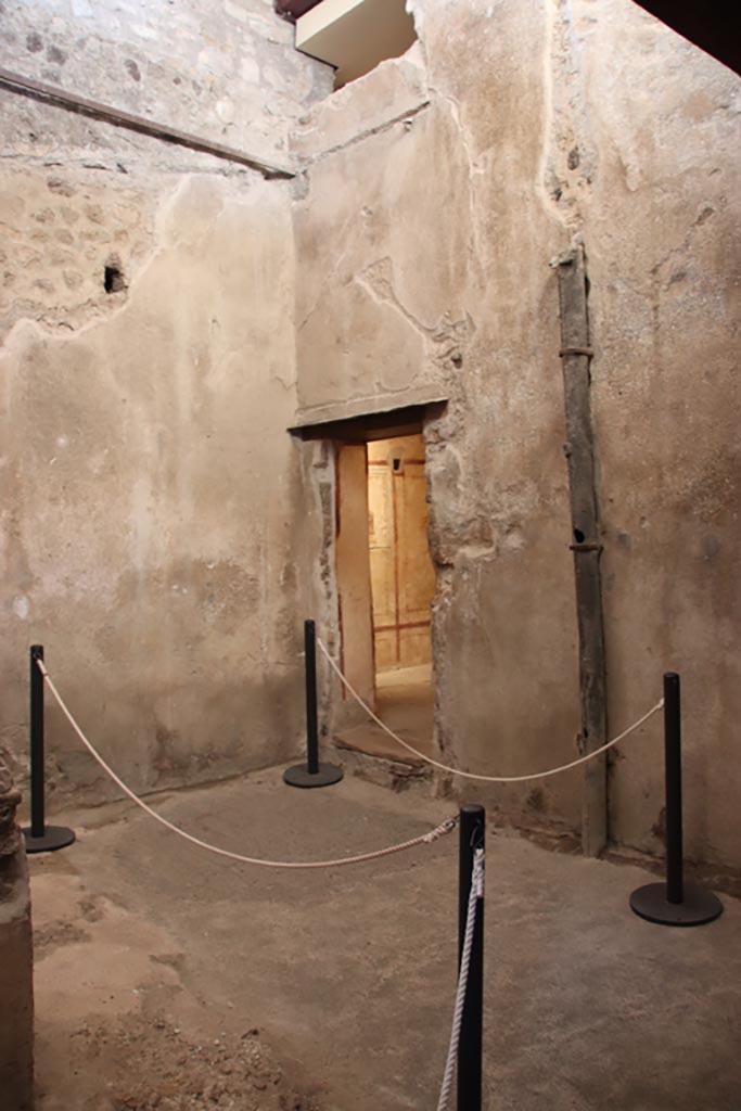 VI.15.1 Pompeii. October 2023. 
Looking towards doorway to bedroom (x’) from kitchen, used either by servants or as a private brothel?.
Photo courtesy of Klaus Heese.

